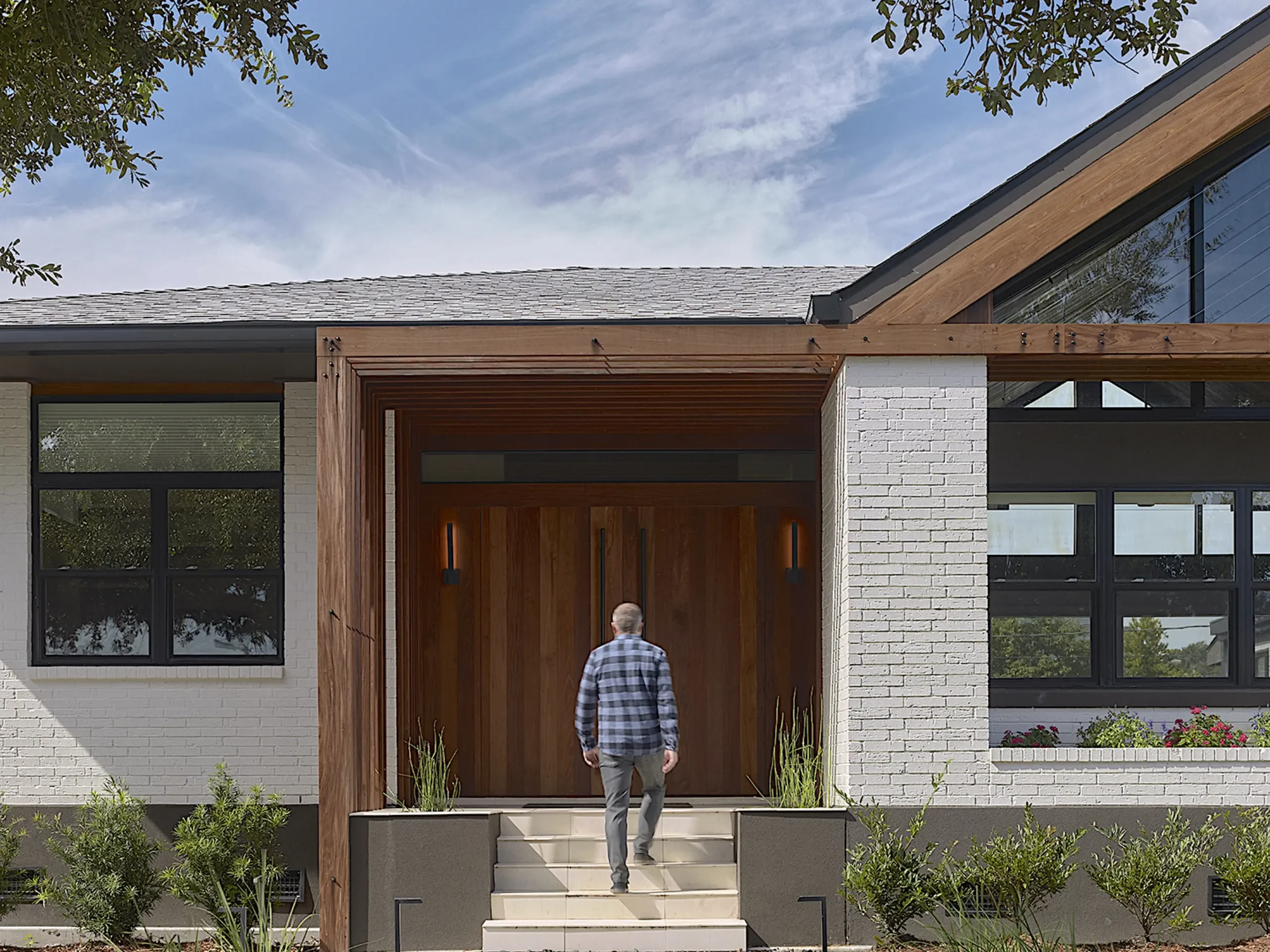 lose-up of the new front door, featuring contemporary materials and detailing.